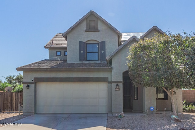 view of front of property featuring a garage