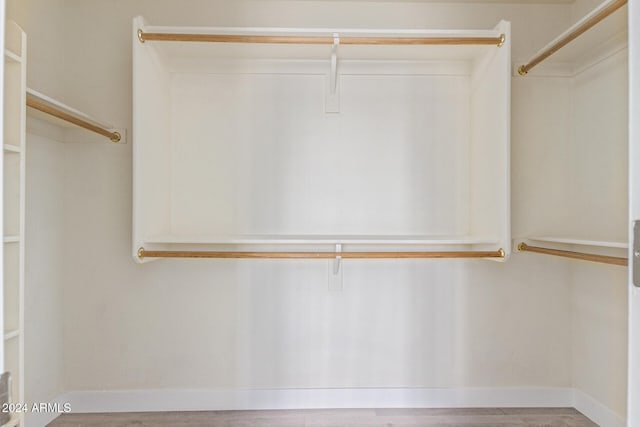 walk in closet featuring wood-type flooring