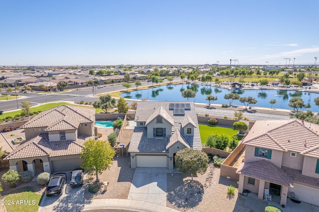 birds eye view of property featuring a water view