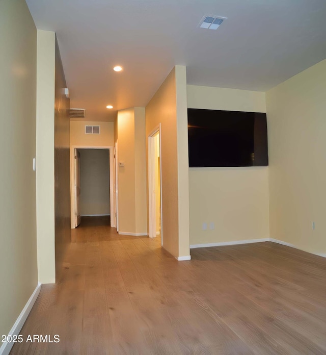 728 S Meadowood Ln, Sierra Vista, AZ 85635 - empty room with wood finished floors, recessed lighting, and baseboards