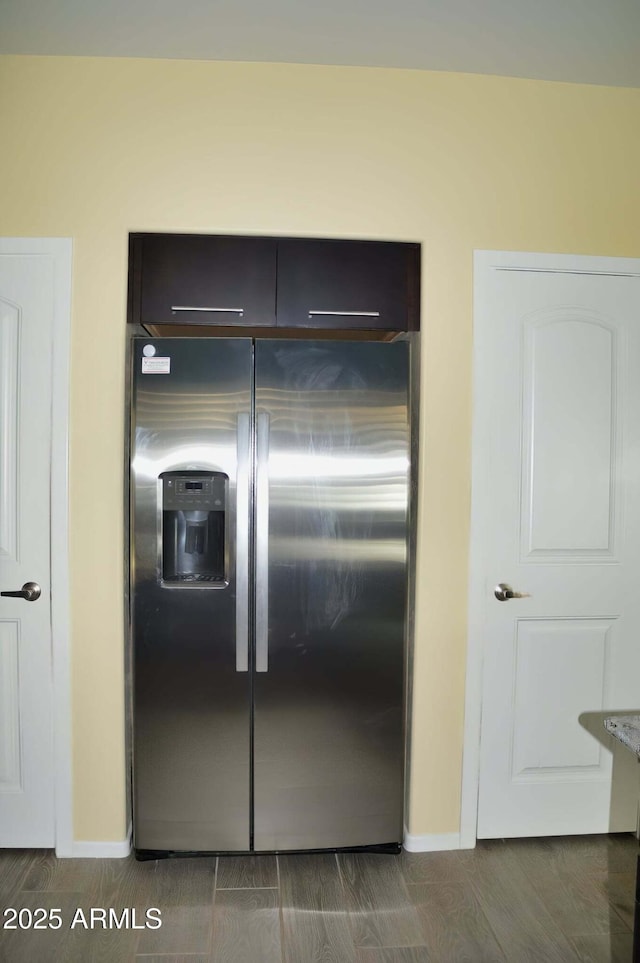 728 S Meadowood Ln, Sierra Vista, AZ 85635 - kitchen featuring stainless steel fridge, baseboards, and wood finished floors