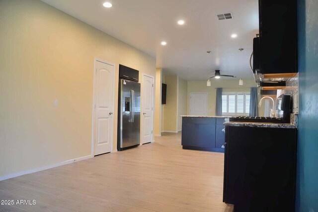 728 S Meadowood Ln, Sierra Vista, AZ 85635 - kitchen with stainless steel refrigerator with ice dispenser, light wood-style flooring, a peninsula, ceiling fan, and recessed lighting