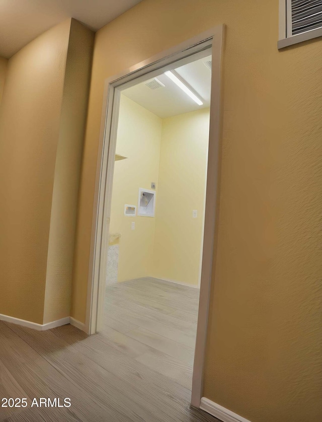 728 S Meadowood Ln, Sierra Vista, AZ 85635 - hall featuring baseboards and wood finished floors