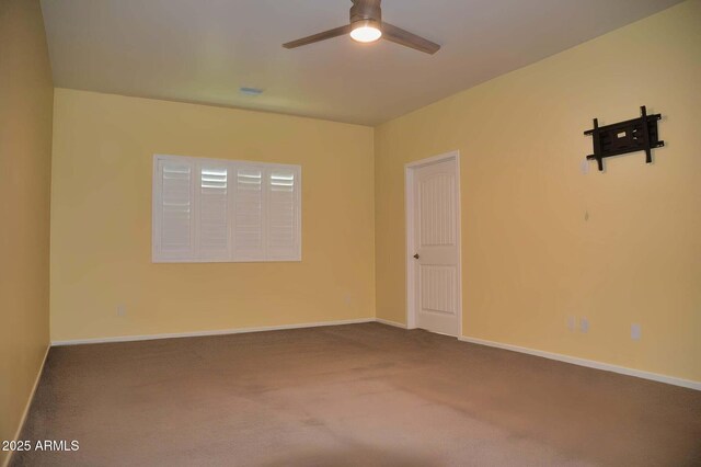 728 S Meadowood Ln, Sierra Vista, AZ 85635 - carpeted spare room featuring a ceiling fan and baseboards