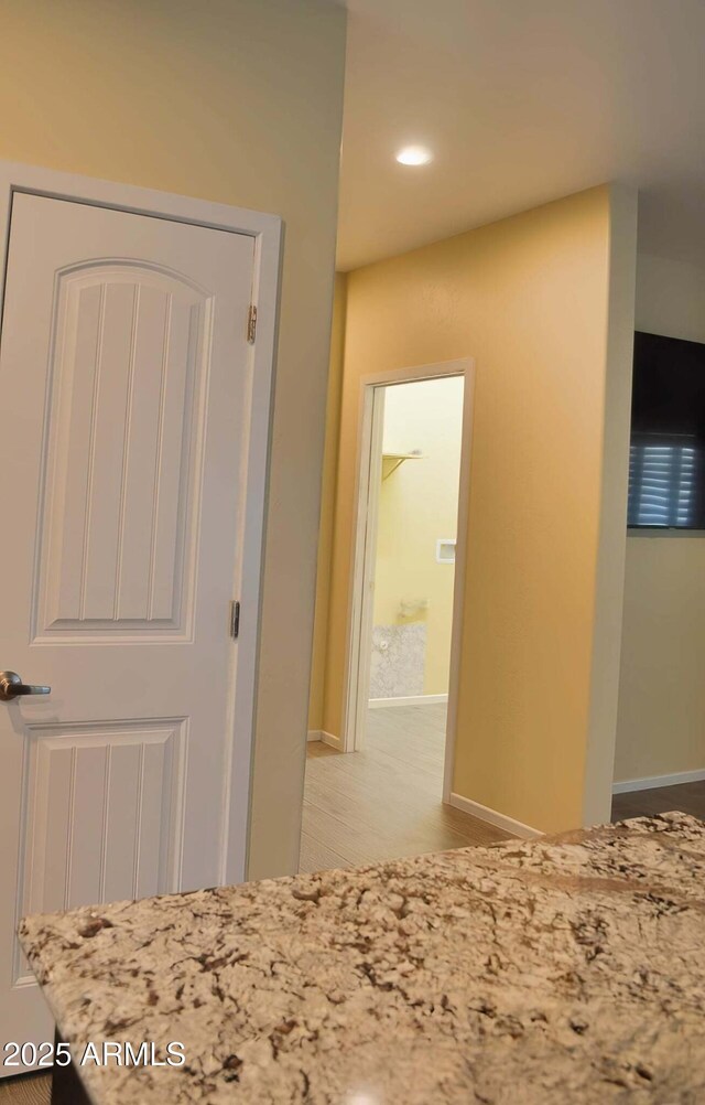 728 S Meadowood Ln, Sierra Vista, AZ 85635 - hallway with baseboards, recessed lighting, and light wood-style flooring