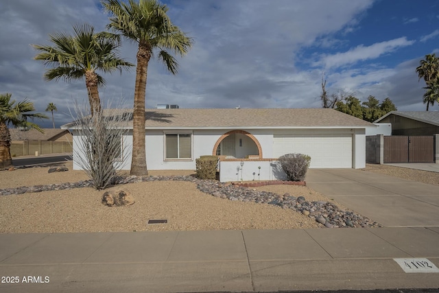 single story home featuring a garage