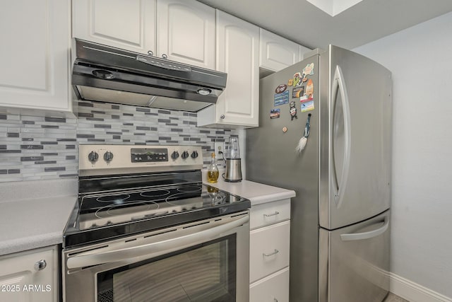 kitchen featuring white cabinetry, appliances with stainless steel finishes, and tasteful backsplash