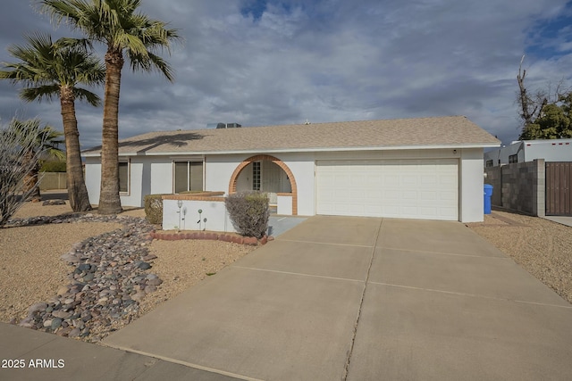 single story home featuring a garage