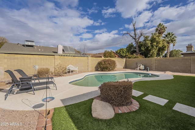 view of pool with a lawn, a patio, and central air condition unit