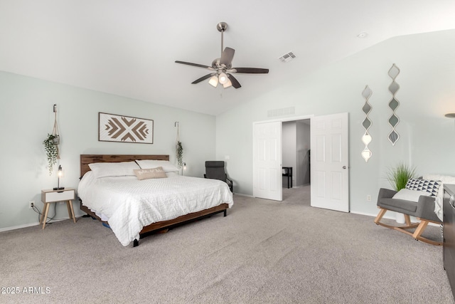 carpeted bedroom featuring vaulted ceiling, visible vents, and a ceiling fan