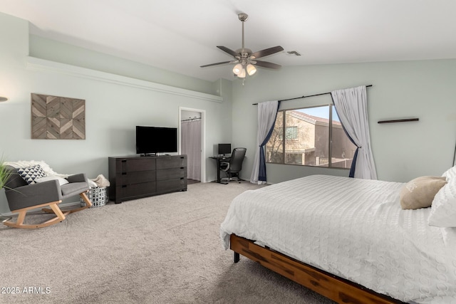 bedroom with lofted ceiling, carpet floors, visible vents, and a ceiling fan