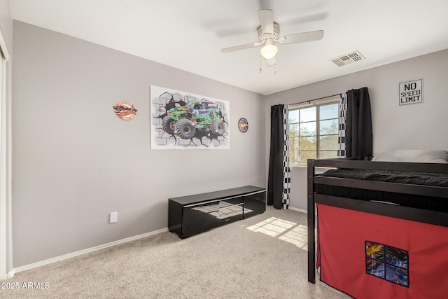 bedroom featuring baseboards, visible vents, a ceiling fan, and light colored carpet