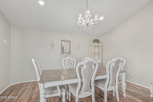 1207 E Clearview Dr, Casa Grande, AZ 85122 - dining area with an inviting chandelier, baseboards, lofted ceiling, and wood finished floors