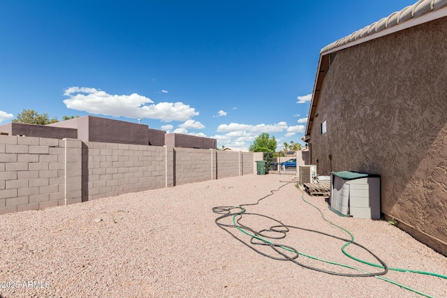 1207 E Clearview Dr, Casa Grande, AZ 85122 - view of yard with a fenced backyard and cooling unit