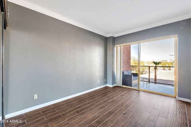 empty room featuring ornamental molding