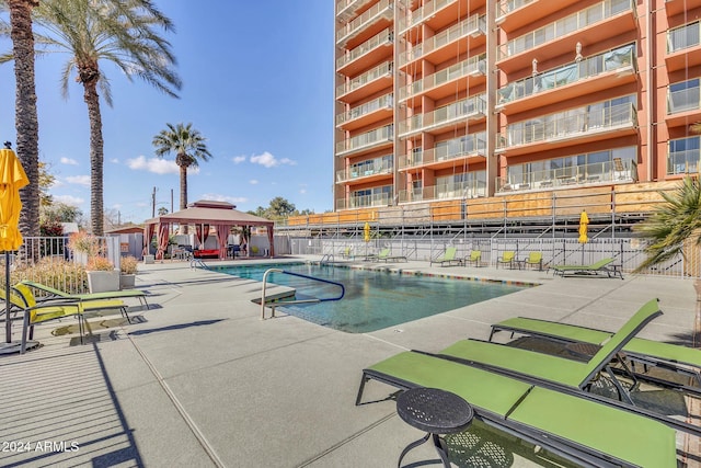 view of pool with a gazebo and a patio area