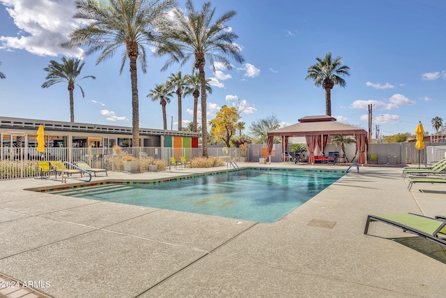 view of pool featuring a gazebo and a patio area