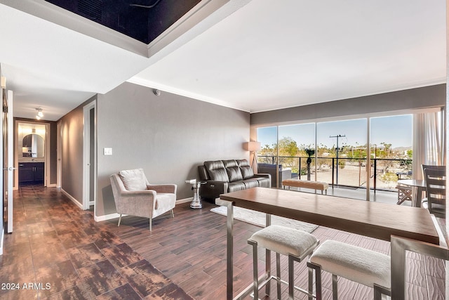 dining area with dark hardwood / wood-style floors