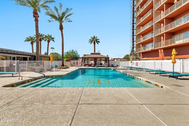 view of pool with a gazebo and a patio