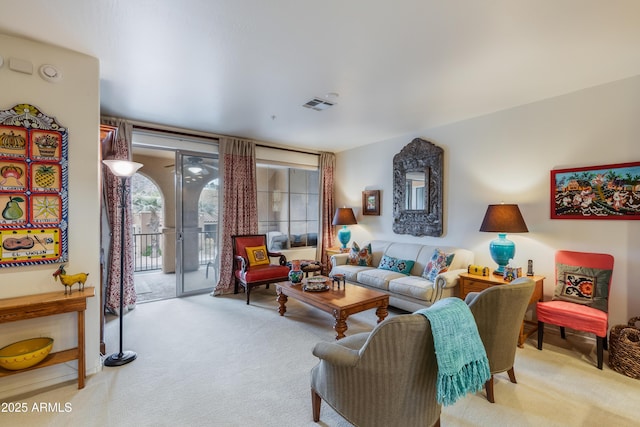 carpeted living room with visible vents