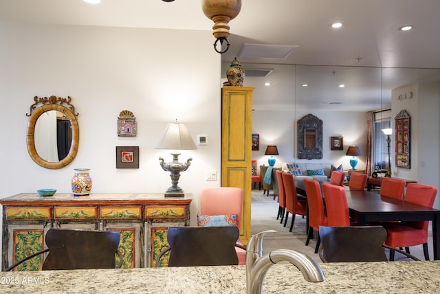 dining room with carpet and recessed lighting