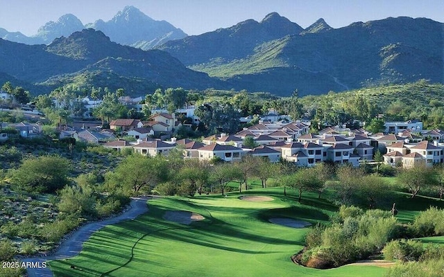 surrounding community with a mountain view, a residential view, and a yard