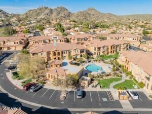 aerial view featuring a mountain view and a residential view