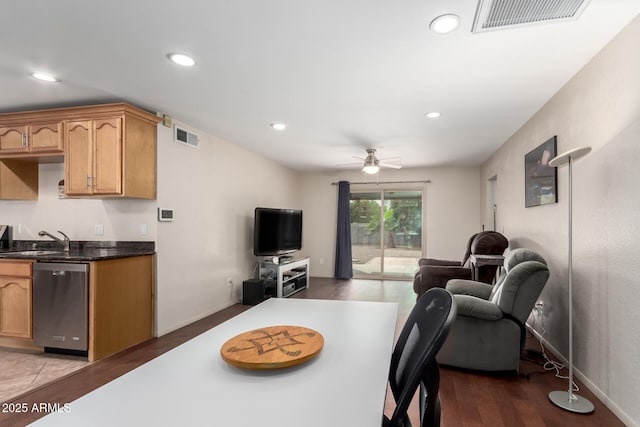 dining room featuring a ceiling fan, recessed lighting, visible vents, and wood finished floors