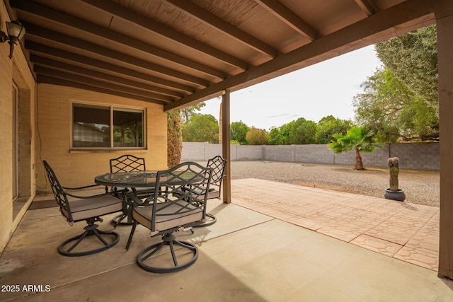 view of patio / terrace featuring a fenced backyard and outdoor dining space