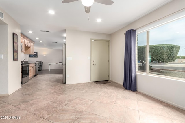 unfurnished room featuring baseboards, a ceiling fan, visible vents, and recessed lighting