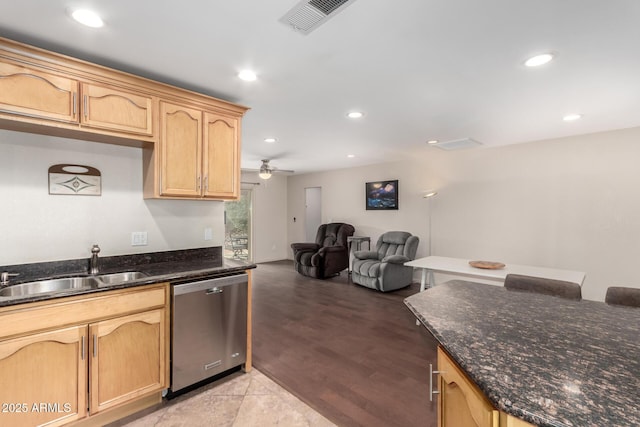 kitchen with visible vents, light brown cabinetry, stainless steel dishwasher, a sink, and recessed lighting