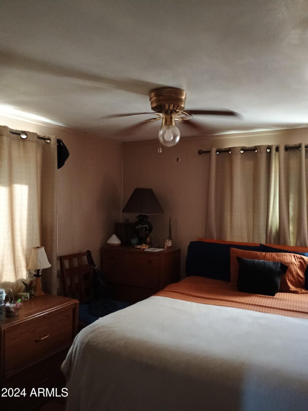 bedroom featuring ceiling fan