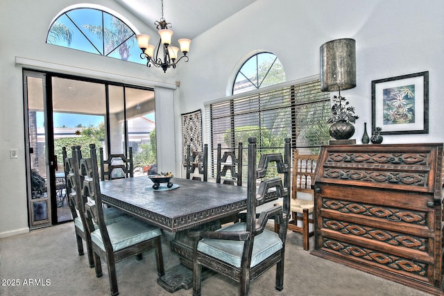 8120 E Cortez Dr, Scottsdale, AZ 85260 - dining room with healthy amount of natural light, a chandelier, carpet flooring, and high vaulted ceiling