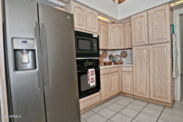 8120 E Cortez Dr, Scottsdale, AZ 85260 - kitchen featuring black appliances, light brown cabinets, and light tile patterned floors