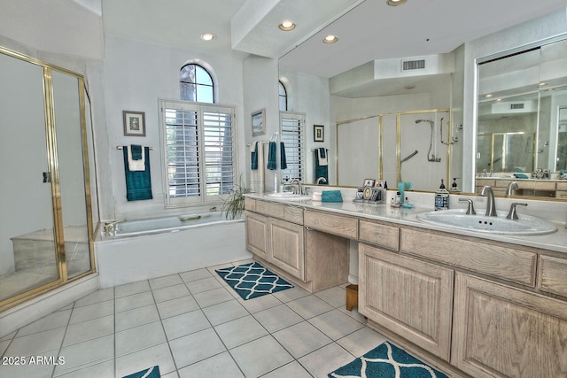 8120 E Cortez Dr, Scottsdale, AZ 85260 - bathroom featuring a stall shower, double vanity, a bath, tile patterned flooring, and recessed lighting