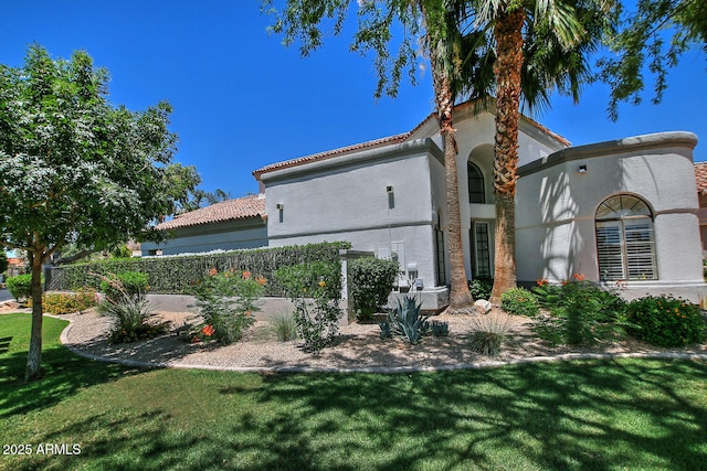 8120 E Cortez Dr, Scottsdale, AZ 85260 - rear view of property with a tiled roof and stucco siding