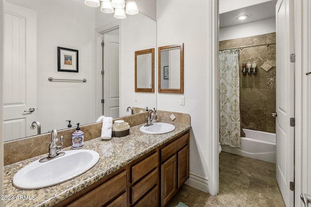 bathroom featuring shower / bath combination with curtain and vanity