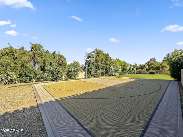 view of sport court with basketball hoop
