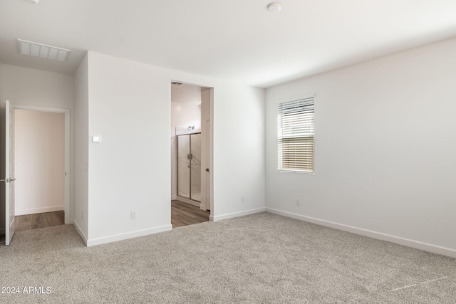 empty room with carpet flooring