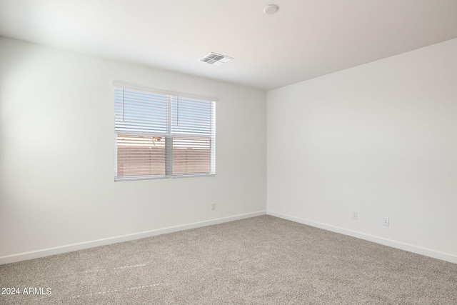 unfurnished room featuring carpet flooring