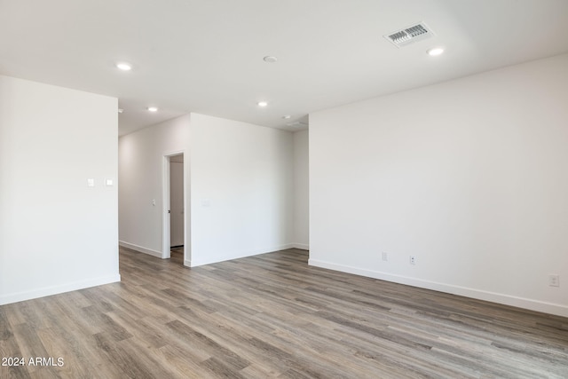 spare room featuring light wood-type flooring