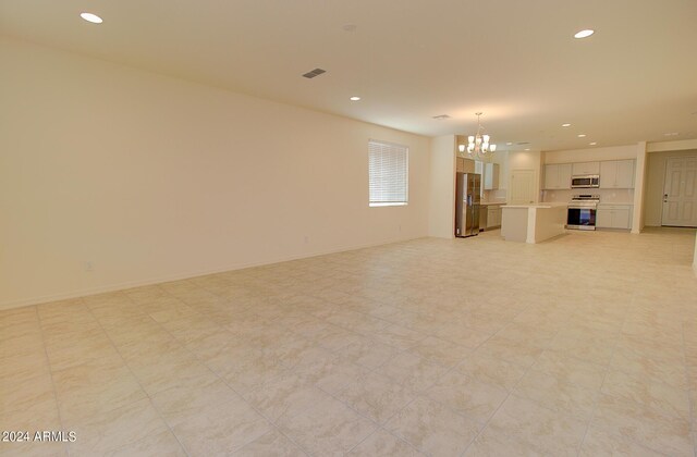 bathroom with vanity, tile patterned floors, and walk in shower