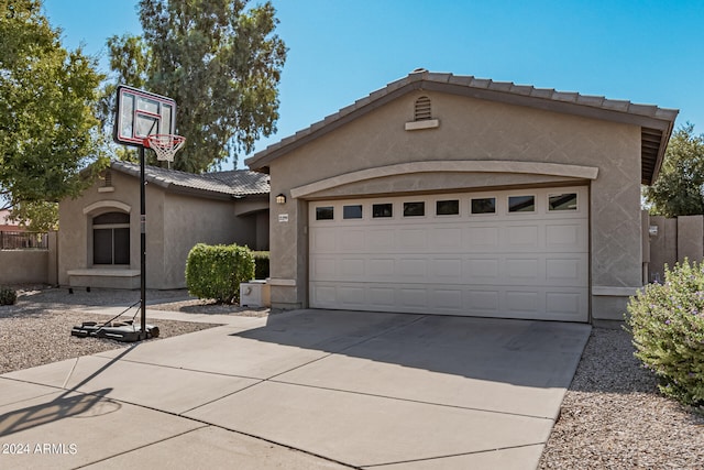 view of front of home with a garage