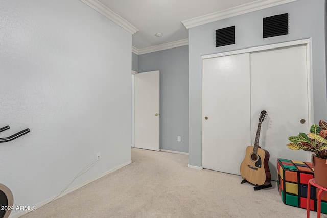 bedroom featuring crown molding and light colored carpet