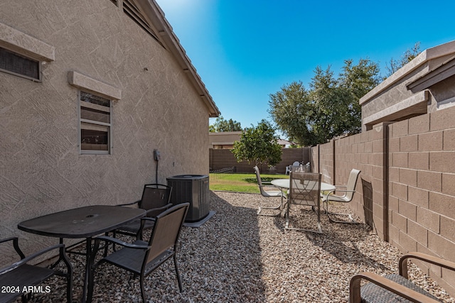 view of patio with cooling unit