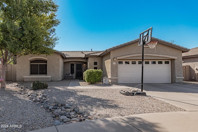 view of front of property with a garage