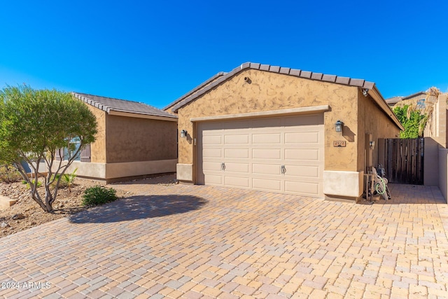 exterior space with a garage