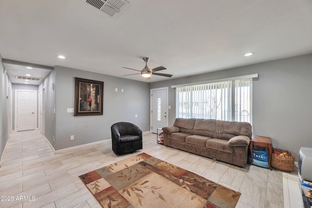 living room featuring ceiling fan