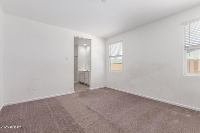 3036 E Riding Boot Way, San Tan Valley, AZ 85140 - spare room with light carpet and baseboards