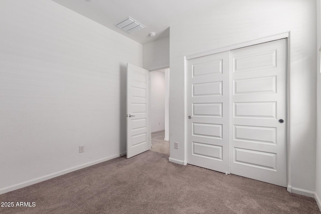 3036 E Riding Boot Way, San Tan Valley, AZ 85140 - unfurnished bedroom with carpet flooring, a closet, and baseboards